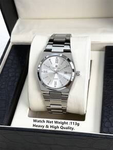 Montre d'affaires charmante pour hommes PABLO RAEZ d'origine. Montre de luxe de marque vintage. Accessoires d'été et de plage, bijoux. Bracelet en acier inoxydable. Boîtier en acier non terni de couleur argent et noir. Aiguilles luminescentes. Résistante à l'eau jusqu'à 50 m. Affichage simple du calendrier et de la semaine. Cadran avec chiffres romains et graduation. Cadeau de mariage