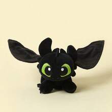 Universal Pictures Llavero de peluche de Toothless de DreamWorks Dragons HTS de 13 cm - Figura colgante sentada, gancho desmontable para mochila, juguete de peluche suave como regalo para niños/fans (con licencia oficial) - Peluche impresionista desdentado perchable - Ver 1