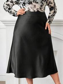 Plus - Size Women's Black Satin Midi Skirt For Autumn And Winter: Pair It With Our Floral Long - Sleeve Chiffon Top, Exuding Elegance And Warmth, Perfect For Office, Parties And Casual Occasions