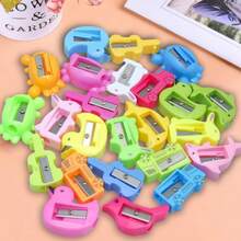 10 / 30 مبراة أقلام ملونة كالحلوى - تصميم صغير محمول باليد وملون، مثالية كهدايا للحفلات وأكياس الهدايا ومكافآت الفصول الدراسية (بأنماط مختلفة)