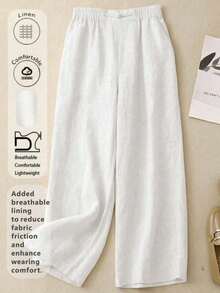 女士简约舒适休闲透气弹力腰亚麻长裤，适合春夏秋季节穿着。裤子饰有手工缝制纽扣。