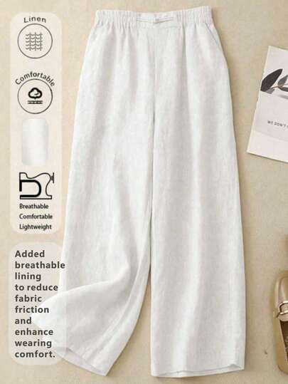 女士简约舒适休闲透气弹力腰亚麻长裤，适合春夏秋季节穿着。裤子饰有手工缝制纽扣。