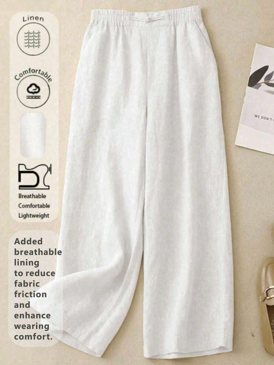 女士简约舒适休闲透气弹力腰亚麻长裤，适合春夏秋季节穿着。裤子饰有手工缝制纽扣。