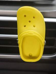 La decoración práctica de la salida de aire del agujero del zapato del coche es divertida.