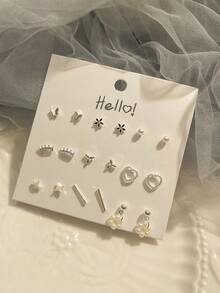 9 أزواج من أقراط الأذن المرصعة بالكامل بالراين بتصميم بسيط على شكل فراشة للنساء