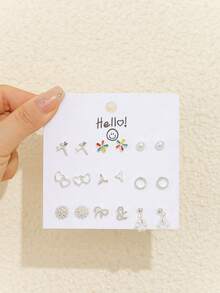 9 أزواج من أقراط الأذن المرصعة بالكامل بالراين بتصميم بسيط على شكل فراشة للنساء