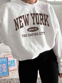 女式秋冬纽约口号图案长袖圆领运动衫，休闲宽松百搭假日风格上衣，时尚秋季女装，适合日常穿着