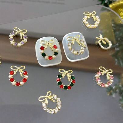10件金色圣诞花环蝴蝶结彩钻珍珠美甲用品立体金属指甲装饰DIY美甲饰品圣诞美甲。
