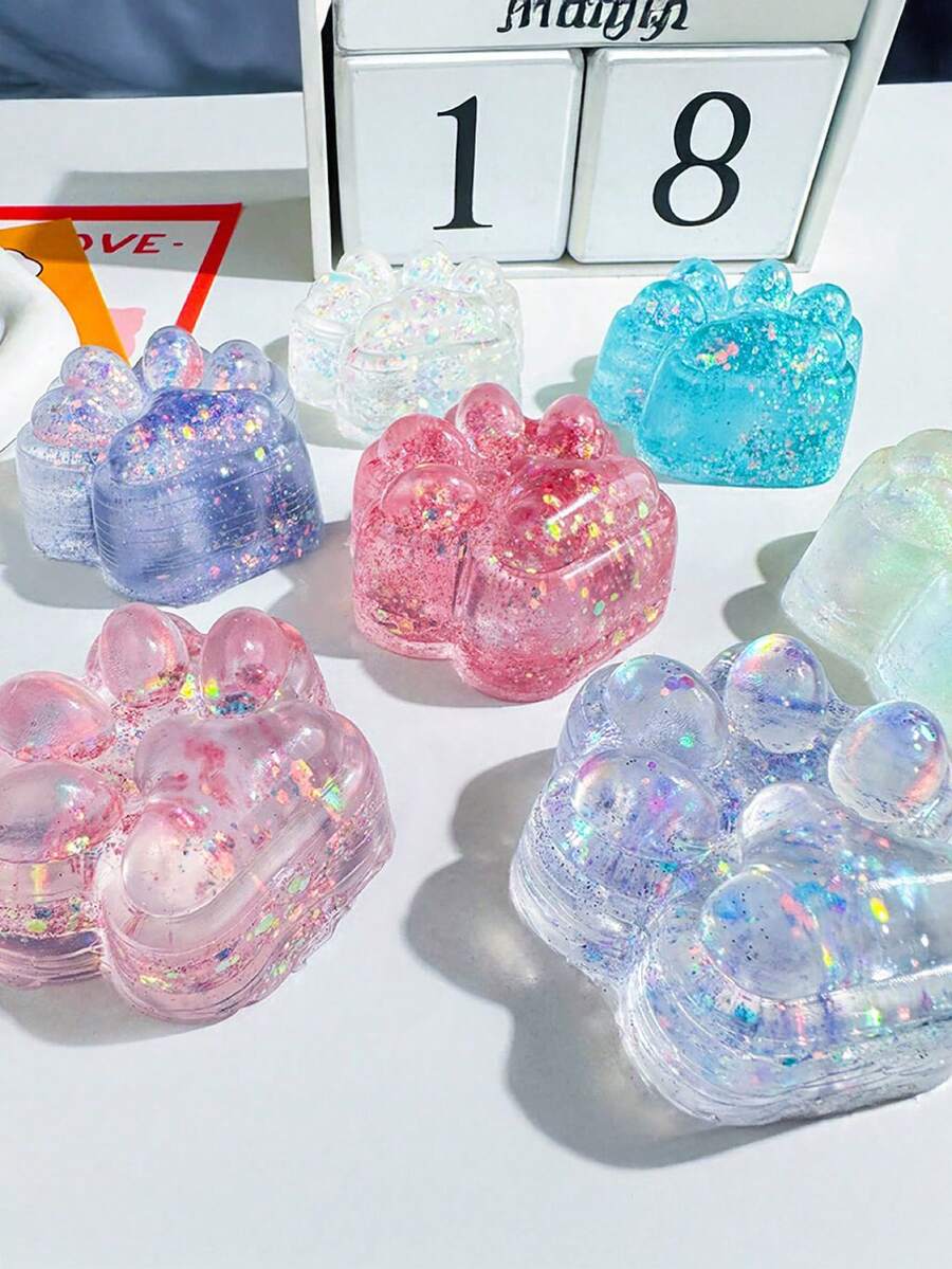 1PC Transparent Glitter Soft Cat Paw Squeeze Toy,Stress Relief And Fun, Great Party Favors And Birthday Gifts For All Ages, Pink For Girls,Blue For Boys,Portable Fidget Squeeze Toy For Your Desk And On The Go, Ideal Holiday Gift, Small Gift Ornament, Cute And Fun, Christmas Gift, Party Favor, Gift Bag Filler, Classroom Prize