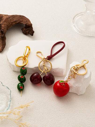 1pc Fashion Fruit Series Keychain Bag Chain, Cherry Apple Olive Pendant, Suitable For Handbags, Backpacks, Makeup Bags, Suitcases, Keychains, Woven Accessories.