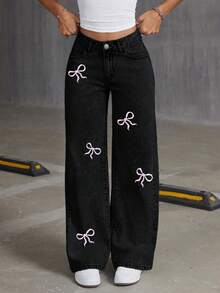 青少年女孩宽松蝴蝶印花喇叭牛仔裤，舒适时尚休闲牛仔裤