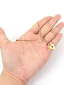 1pc 18K Gold Plated Stainless Steel Letter Heart Necklace, Minimalist 26 English Alphabet Necklace For Women, Mom Gifts (Recommended To Wrap Around The Heart Twice To Prevent It From Falling Off Easily) - Yellow Gold - View 2