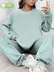 Dwuczęściowy, sportowy kostium damski z długim rękawem wykonany z czystej bawełny, wiosenno-letni, w stylu college'owym, z miękkiego, oddychającego materiału, o dopasowanym kroju i modnym kroju.