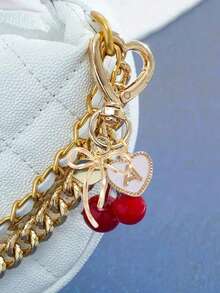 Móc khóa hình quả anh đào dễ thương, thời trang, màu vàng kim - Móc khóa hình quả anh đào, phụ kiện trang trí ba lô sành điệu, móc khóa, mặt dây chuyền hợp kim chữ cái A-Z, mặt dây chuyền tai nghe, mặt dây chuyền xe hơi, mặt dây chuyền trang trí, móc khóa hình quả anh đào, phụ kiện túi xách, kẹp túi, phụ kiện nhựa và kim loại sáng bóng, ví và túi xách nữ, phụ kiện ba lô - Nhiều màu - Xem 9