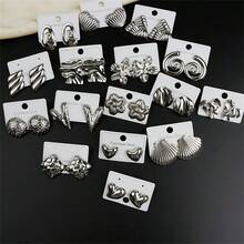 Set da 9 pezzi di orecchini in stile casual, set di orecchini geometrici in acciaio inossidabile con fiore/farfalla/ala/goccia d'acqua/conchiglia. Orecchini minimalisti e alla moda adatti per l'uso quotidiano delle donne o come regalo (consegna casuale) - Argento - Visualizzare 2