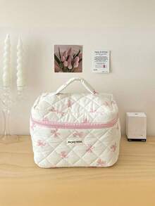 1个韩版女士格子蝴蝶结化妆包，大容量旅行化妆品收纳包，必备礼品，可收纳化妆品、洗漱用品、配饰，亦可作房间装饰、包包、梳妆台用品、储物包。