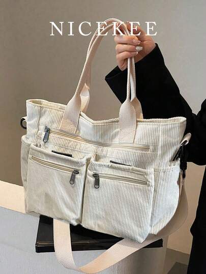 新款时尚经典学院风休闲大容量多口袋单肩包，特别保暖。尤其适合校园、办公室、日常搭配、约会、购物、郊游、送礼等场合。