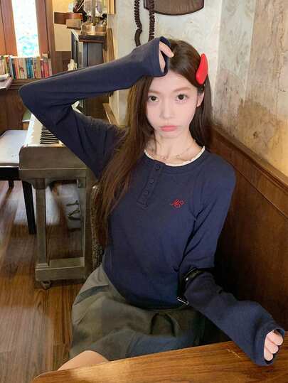 秋冬韩版蕾丝拼布圆领纽扣设计二合一长袖T恤