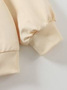 Tween 女童连帽卫衣是一款 Y2K 风格的长袖连帽运动服。它印有可爱的水豚图案，简约时尚。适合日常休闲穿着，春秋冬三季均可穿着。 - 杏色 - 查看 6