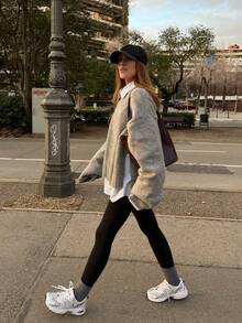 سويتر نسائي من الصوف المحبوك بأكمام طويلة وياقة طاقم، لون رمادي داكن، مقاس كبير، تصميم أكمام مستقيمة مع شق جانبي، قطعة مريحة للارتداء اليومي