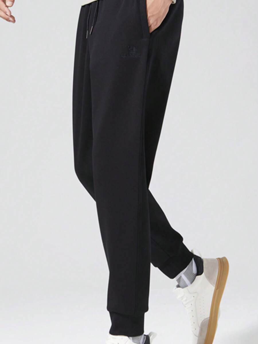 CAMEL CROWN 男士休闲裤秋冬新款纯棉针织运动裤修身袖口百搭运动裤 - 黑色 - 查看 1