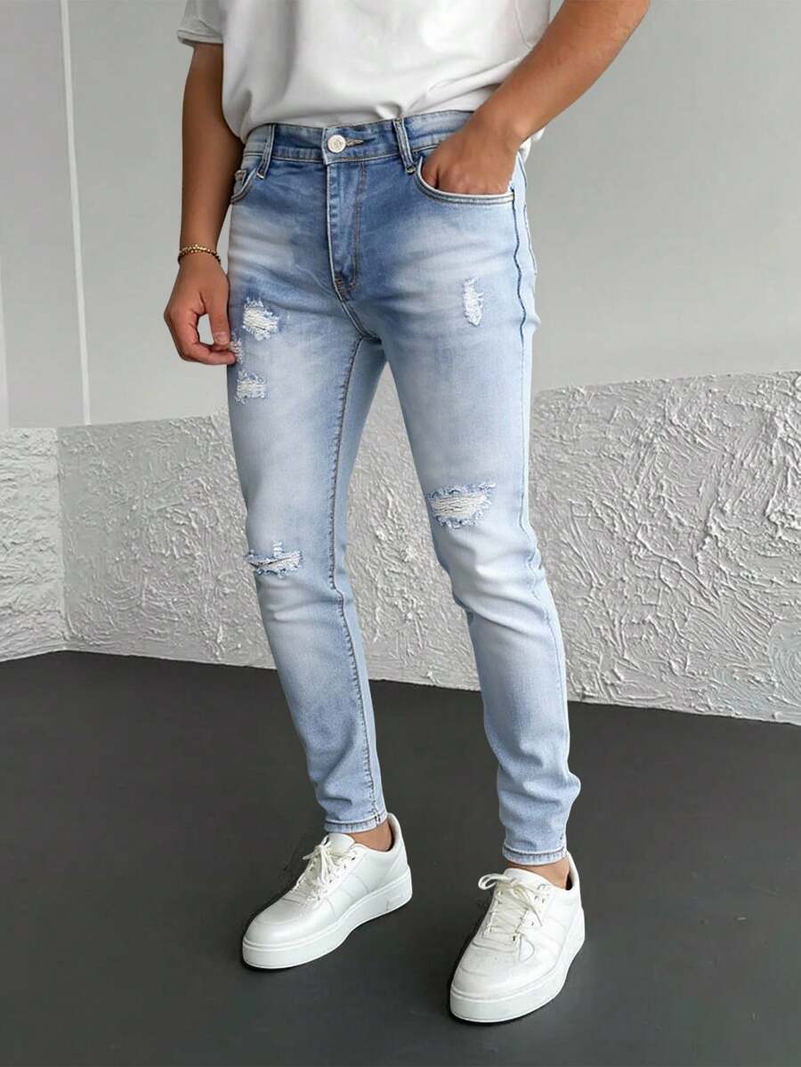 Pantalones vaqueros azul claro con rotos y efecto lavado, tiro alto y corte entallado, estilo moderno y casual - Lavado ligero - Ver 1