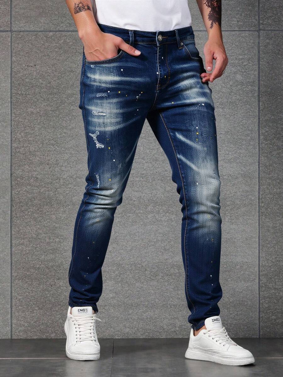Pantalones vaqueros azul oscuro con salpicaduras y rotos, tiro alto y corte entallado, estilo moderno y casual - Azul lavado oscuro - Ver 1