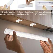 1 pieza Luz LED ultradelgada con sensor de movimiento y iluminación regulable de 3 colores, instalación inalámbrica con clip, ideal para gabinetes, armarios, estanterías y escaleras.