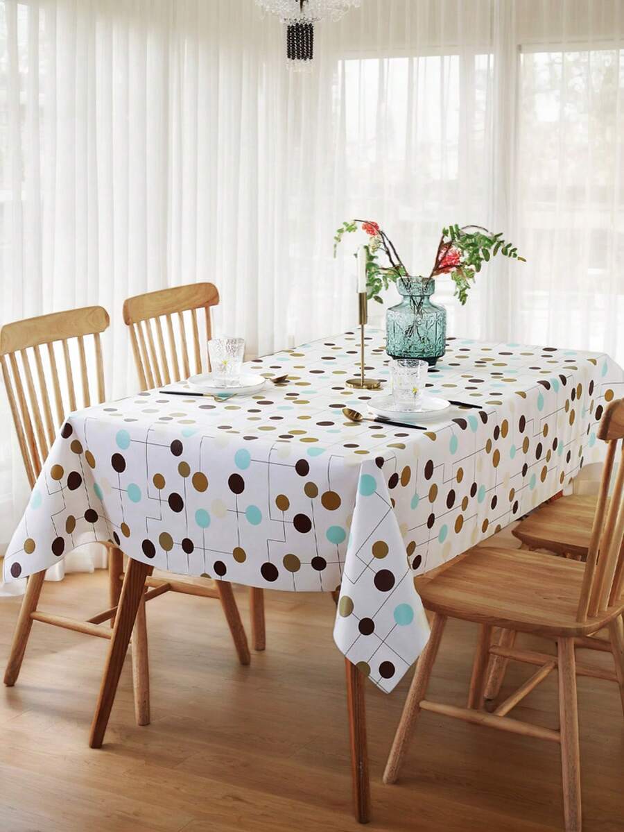 Obrus z tworzywa sztucznego PVC z prostym, okrągłym wzorem graficznym do dekoracji blatu. Nadaje się do dekoracji na zewnątrz, do salonu, kuchni, na festiwale i imprezy.