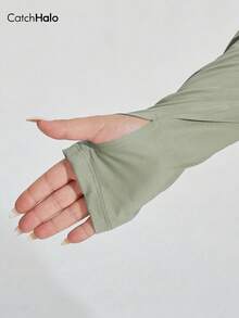 大码女式长袖宽松运动上衣，带拇指孔和镂空后背设计，适合秋季、冬季、健身房锻炼和春季休闲穿着。 - 薄荷綠 - 查看 11