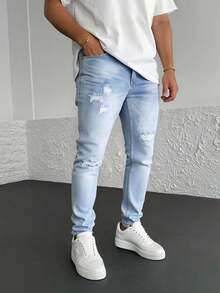 Pantalones vaqueros azul claro con rotos y efecto lavado, tiro alto y corte entallado, estilo moderno y casual - Lavado ligero - Ver 3