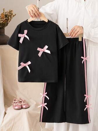 2pcs/Set 2025 New Girls Short Sleeve & Pants Set, Casual Cute Round Neck Top With Stripe & Bow Decor, Loose Straight Leg Pants, Suitable For Outdoor & Daily Wear