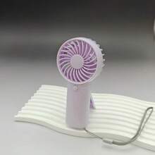 1pc Mini Hand-Held Fan With Wrist Strap, 1 Speed Setting, Requires AAA Battery (Not Included)