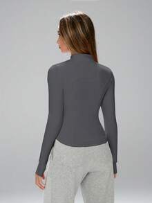 FWH Veste de sport à manches longues pour femmes, de style mode, col montant, pour le running, le yoga, l'exercice et le style casual. Tissu confortable et extensible, avec une taille affinée visuellement. Polyvalente et jeune, offrant une protection solaire.