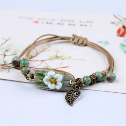 BMOR 1 pezzo Braccialetto in ceramica intrecciato con fiore, braccialetto in ceramica fatto a mano con girasole e foglia, gioiello boho regolabile per donna, regalo vintage