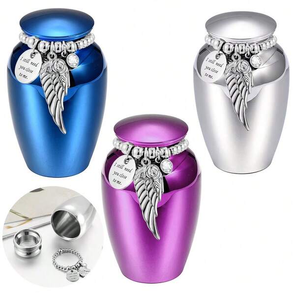 Pequenas urnas de lembrança para cinzas de animais de estimação humanos de 6,5 cm com pingente de asa Mini urnas de cremação em liga de alumínio