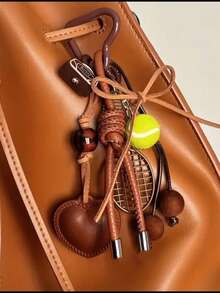 皮革心形网球拍细节钥匙扣汽车吊坠，男女通用，可拆卸设计。它是健身爱好者的完美之选，也是男女皆宜的理想礼物，适合装饰背包、斜挎包、棕色包包以及钥匙和包包挂饰。 - 彩色 - 查看 1