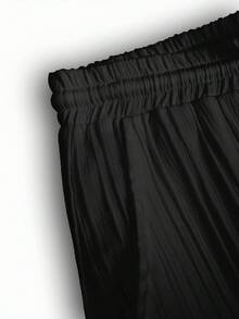 Conjunto informal de dos piezas para hombre (camisa de manga corta lisa con textura + pantalón recto con cintura elástica y cordón). - Negro - Ver 8