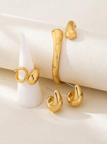 Set de joyería de 2 piezas con anillo y pendientes de forma de gota de agua con acabado liso y metálico minimalista y elegante para mujer