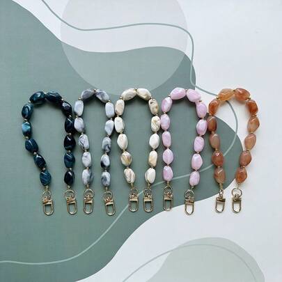 Modieuze asymmetrische jade-achtige acryl handgemaakte kralen telefoonhanger