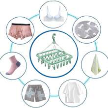 [Economia de espaço] 1 cabide multifuncional, projetado para economizar espaço e comprimir espaço, suporte de armazenamento com 32 clipes, armazenamento, cabide dobrável, secadora multifuncional, clipe de plástico à prova de vento para uso doméstico, cabide com vários clipes de meia, itens domésticos, armazenamento de viagem, cor e estilo aleatórios (PS: É normal que os clipes caiam durante o transporte e não há problemas com a qualidade do produto. Eles podem ser usados após a instalação)