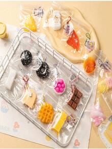 5件装食物揉捏玩具袋装PVC吊坠缓解压力感官玩具自闭症玩具万圣节圣诞节钥匙扣，每件独立包装，内含各种不同食物，挤压即可释放压抑的情绪。（款式随机） - 彩色 - 查看 4