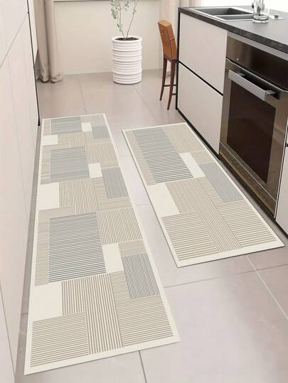 1块硅胶厨房垫，由不同大小的矩形块组成，带有平行垂直条纹的极简几何图案，浅米色、浅灰色调，营造简约现代的视觉效果。奢华时尚厨房垫，缓冲抗疲劳，表面织物材质，中间海绵吸水材质，底部橡胶材质防滑防水厨房地毯浴室厨房装饰