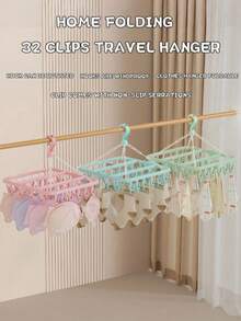 [Economia de espaço] 1 cabide multifuncional, projetado para economizar espaço e comprimir espaço, suporte de armazenamento com 32 clipes, armazenamento, cabide dobrável, secadora multifuncional, clipe de plástico à prova de vento para uso doméstico, cabide com vários clipes de meia, itens domésticos, armazenamento de viagem, cor e estilo aleatórios (PS: É normal que os clipes caiam durante o transporte e não há problemas com a qualidade do produto. Eles podem ser usados após a instalação)
