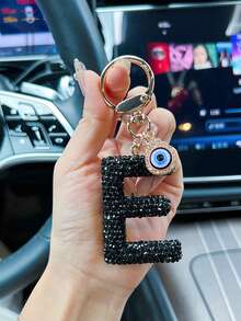 合金水钻恶魔眼字母钥匙扣，时尚手提包吊坠配圆环扣，单件新奇女士钥匙扣，黑色首字母汽车钥匙吊坠，男女通用包包小吊坠，可挂于手提包、背包、托特包、单肩包、车钥匙、门钥匙、餐卡、工作卡等，时尚，是馈赠家人、朋友的绝佳礼物， - 彩色 - 查看 4