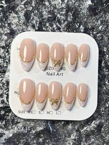 10pcs Handmade French Short Nail Stickers. This Manicure Set Includes 5 Colors: White, Pink, Gold, Blue, And Yellow, With A Charming And Design. Each Nail Sticker Is Decorated With Hand-Painted Vine Patterns That Wind Along Metallic French, And Are Embellished With Gold And Bow Accents. - 藕粉色 - 查看 7