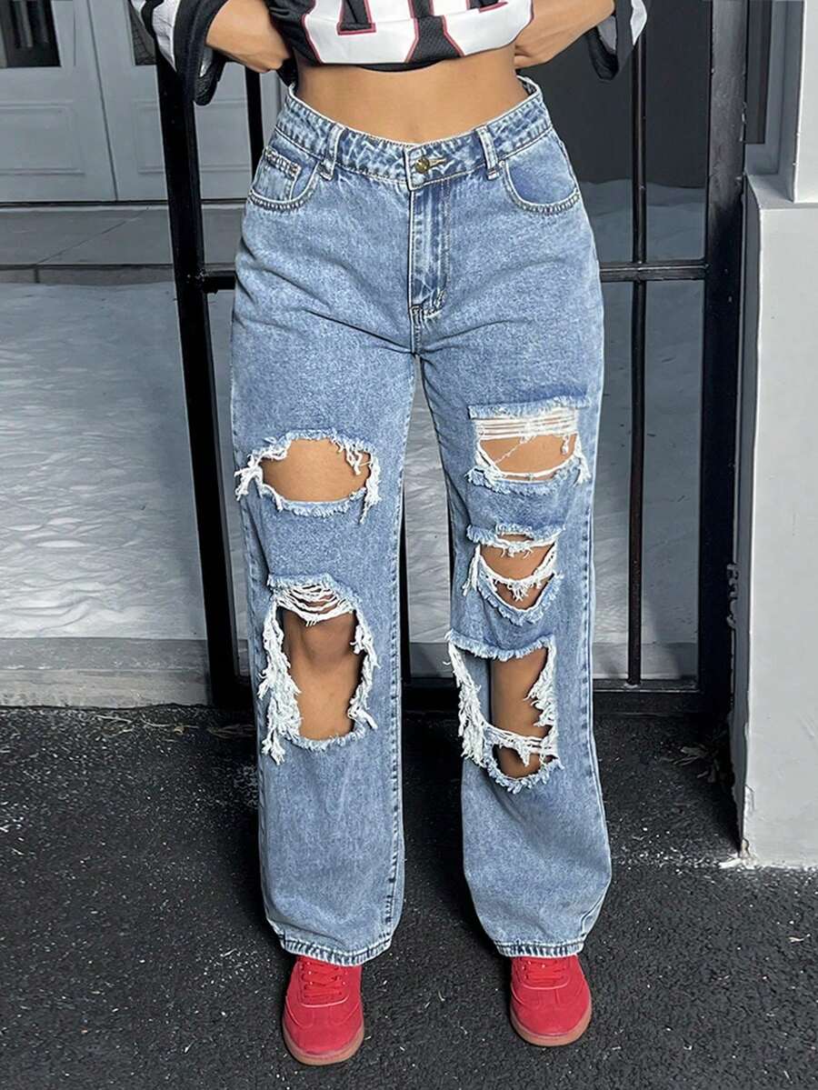 La moda de otoño de las mujeres está llena de agujeros rotos, pantalones vaqueros sueltos y rectos - Lavado ligero - Ver 1