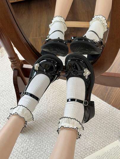 1 par de zapatos Mary Jane negros con decoración de lazo y corazón, diseño con hebilla, de moda y versátiles, nuevos lanzamientos de primavera/otoño, estilo clásico de colegiala, suelas gruesas, adecuados para adolescentes
