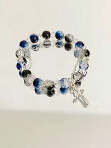 1pc Cool Blue Cross Bracelet. Transparent Blue Crystals Are Strung Together To Form The Chain, Adorned With A Silver Cross Pendant, Exuding A Cool And Crisp Vibe. The Blue Hue Resembles The Deep, Luminous Depths Of The Ocean, While The Cross Features Clean, Sharp Lines. The Silver Chain Is Delicate And Hugs The Wrist Comfortably. Under The Play Of Light And Shadow, The Crystals Refract Delicate Blue Hues, And The Silver Accents Shimmer With A Matte, Cool White Glow. Whether Worn Alone Or Layered With Other Pieces, It Evokes A Sense Of Detachment And Minimalist Elegance, Perfectly Complementing Minimalist Outfits And A , Tranquil Aesthetic.Perfect Gift For Birthdays, Holiday Gifts, And Parties. Suitable For Daily Wear And Holiday Celebrations, Suitable For All Seasons, And Is An Ideal Choice For Holiday Accessories.