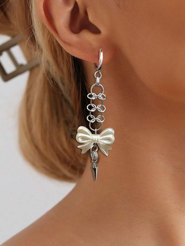 زوج من الأقراط الأنيقة ذات الشرابات والفيونكة، مناسبة للاستخدام اليومي أو ارتداء الحفلات للنساء